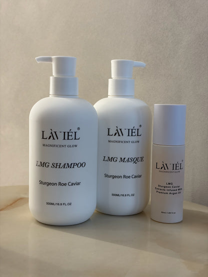 Three Lavièl haircare products on a beige background